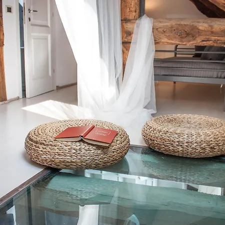 At The Pier Of - The House Of Travelers