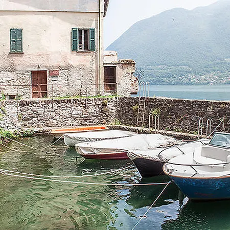 At The Pier Of - The House Of Travelers