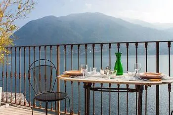 At The Pier Of - The House Of Travelers Brienno