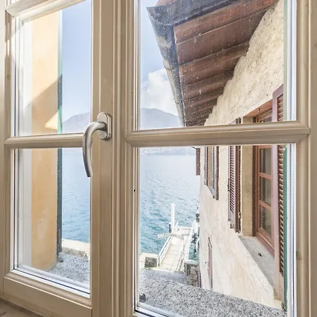 At The Pier Of - The House Of Travelers