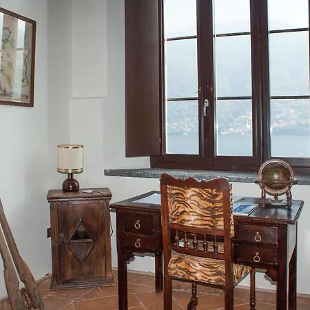 At The Pier Of - The House Of Travelers Brienno